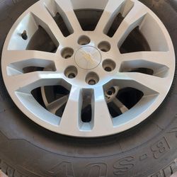 Full SIZE 18IN WHEEL & TIRE.           (Need a SPARE)