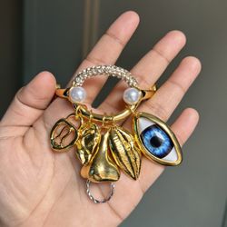 Schiaparelli Inspired facial feature Charm Bracelet