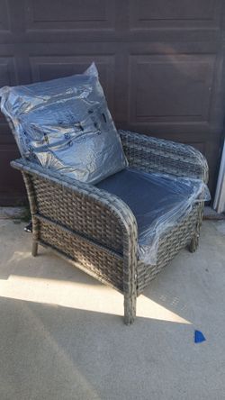 2 Grey wicker patio chairs  with Grey cushions