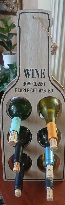 FOLDING WINE RACK WITH EMPTY WINE BOTTLES