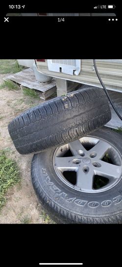 5 jeeps rims and tires