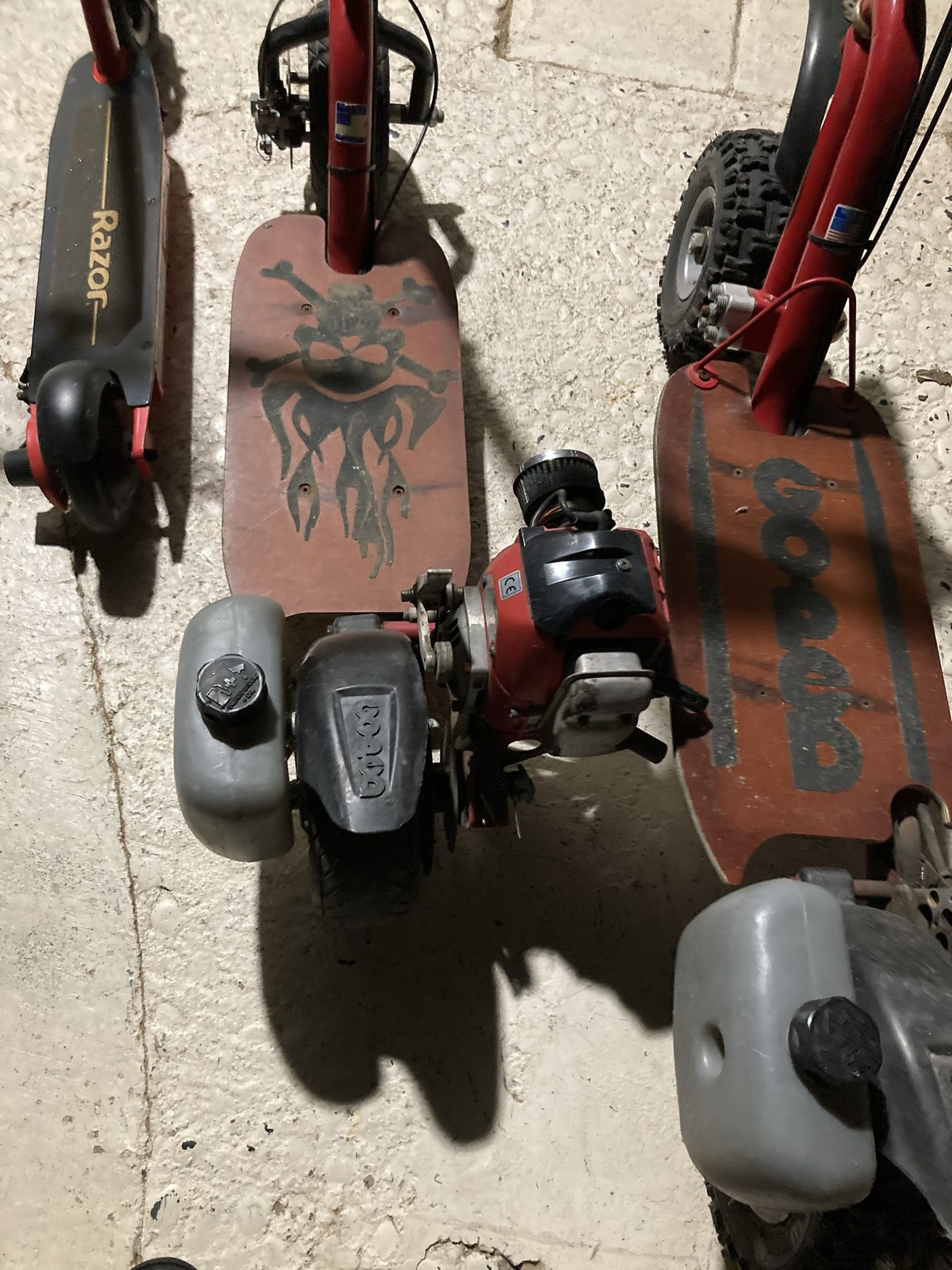 Two Gas Gopeds And Electric Razor Scooter