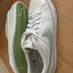 Nike - New Boys 7.  Women’s 9