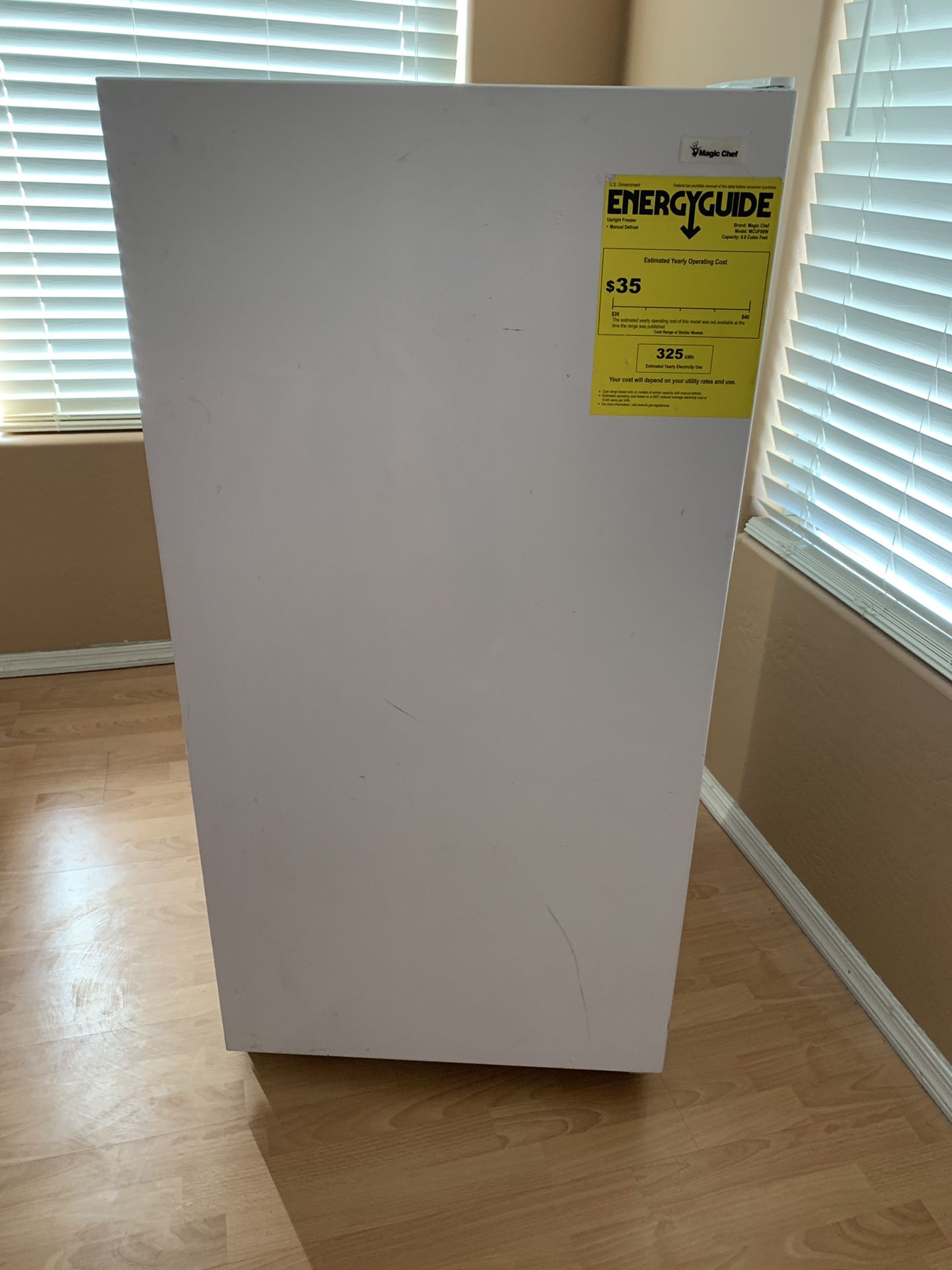 Small upright freezer 48” high 23 1/2” wide and 29” deep $50
