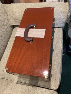 Abercrombie and Fitch mahogany tacklebox withOrvis flys and Orvis fly rod 8.5 ft impregnated bamboo and hardy reels smoke free environmenthot Rod