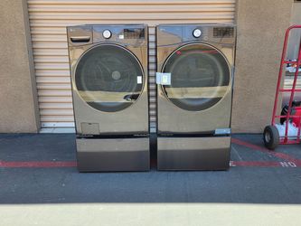 LG thinQ Front Load Washer And Gas Dryer W Pedestal sidekick