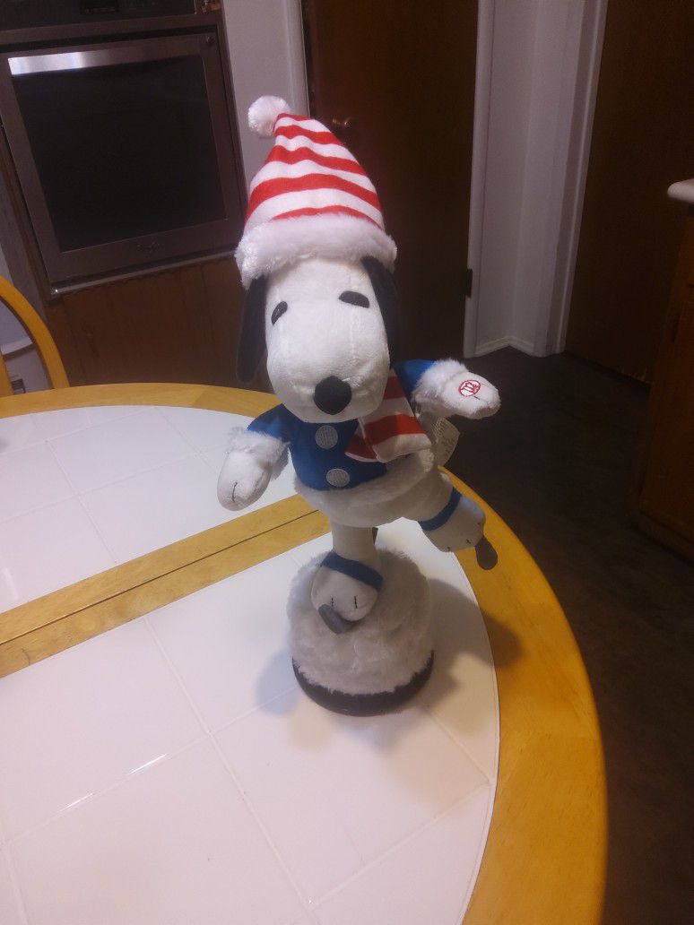 Snoopy Twrills And Plays Music.  New Batteries 