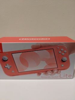 Brand new Nintendo switch lite coral