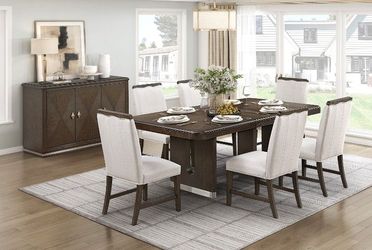 Elegant dining set finished in a beautiful wire-brushed brown w/extension leaf 