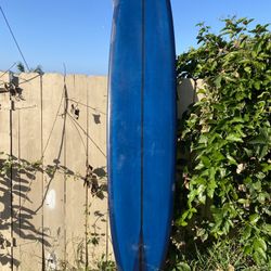 Grant Noble for Russel Longboard Noserider model 9’8”