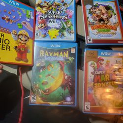 5 Nintendo Wii U Games.3 mario .1 donkey Kong 1 Rayman