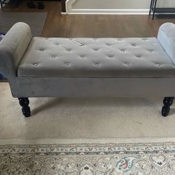 Tufted grey velvet storage bench