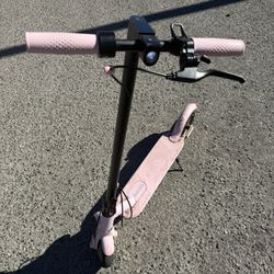 Pink RoinSide Eletric Scooter 19 Mph 15 Mile Range Used