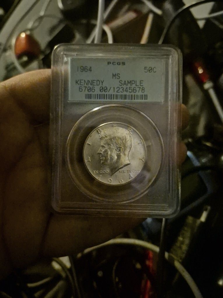 PCGS Mint uncirculated Rated 1964 90% silver Kennedy half dollar