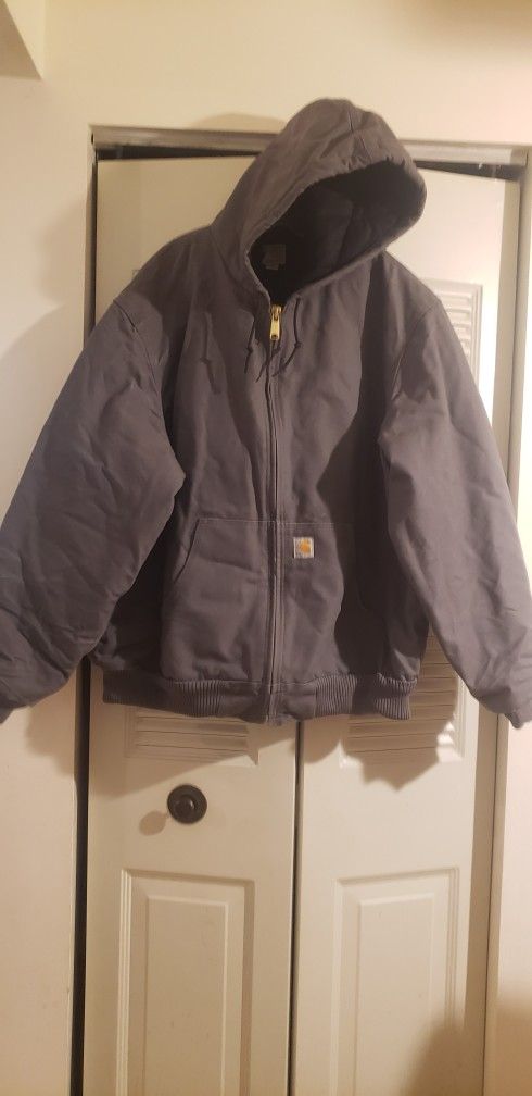 Carhartt jacket color gravel/Grey
Mens 2XL Hooded Zip Carhartt Jacket. Style J140- GVL. Color Gravel/Gray.