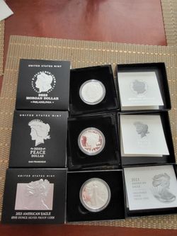 Morgan  + peace  + eagle silver dollars