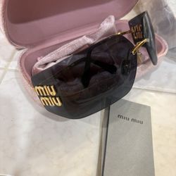 Miu Miu  Sunglasses brand new in the case
