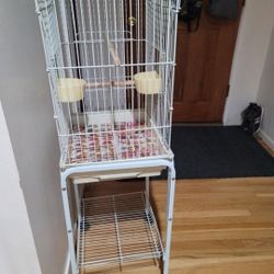 Bird cage with stand with wheels rolling dishes. Included