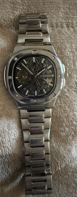 Ice time Automatic watch with genuine diamonds box included,retail  price 900.00 everywhere  beautiful watch.