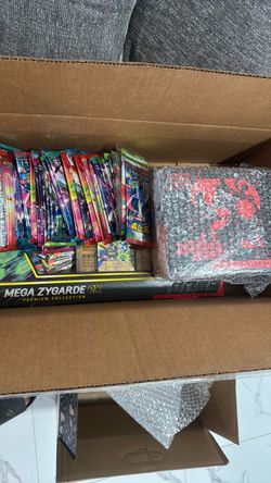Pokemon etb and single packs and zygarde box