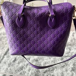 • Purple Gucci Handbag •