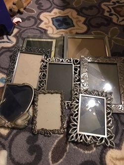9 assorted picture frames 5x7