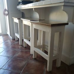 Set Of Four Bar Stools. Seats are out of oak wood