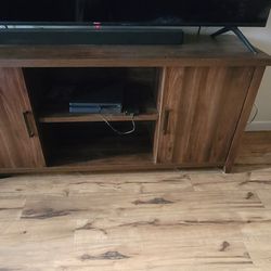 75 inch TV Entertainment center and vizio sound bar system cordless subwoofer