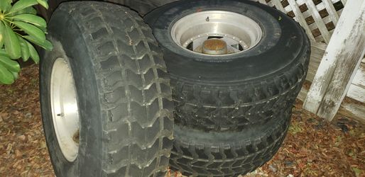 Four 37" x 12.5" tires and 16.5" rims