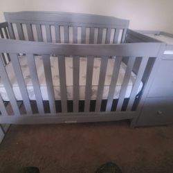 Crib with changing table