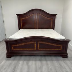Beautiful King size wooden bed, mattress and boxspring included for free. Delivery available for an additional cost.