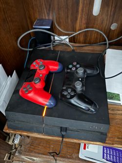 PS4 w/ 1.75 Tb hard drive, power cord &  micro USB usb cord  and 2 controllersq