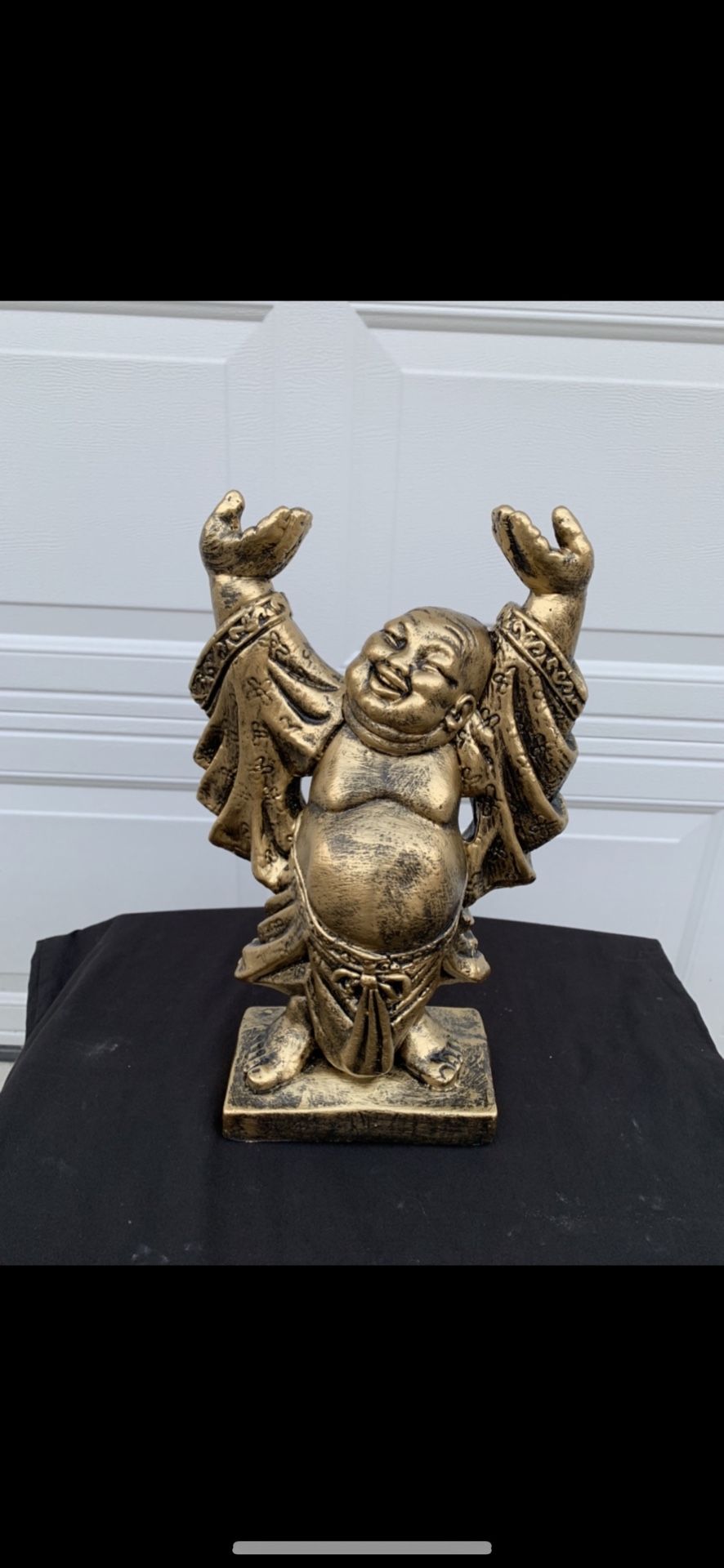 Hands Up Buddha statue