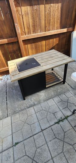 Outdoor fire pit table
