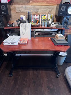 Up for sale, is a Studio Trends STLD46-Studio Desk / Black Metal & Mahogany Finish / 4U x 4U / Excellent Condition