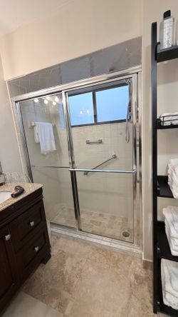 Sliding chrome shower door 70” x 59”