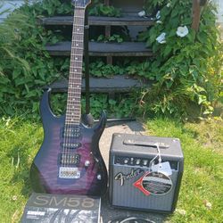 Ibanez Guitar, Fender Amp, Shure SM58 Corded Microphone & Stand