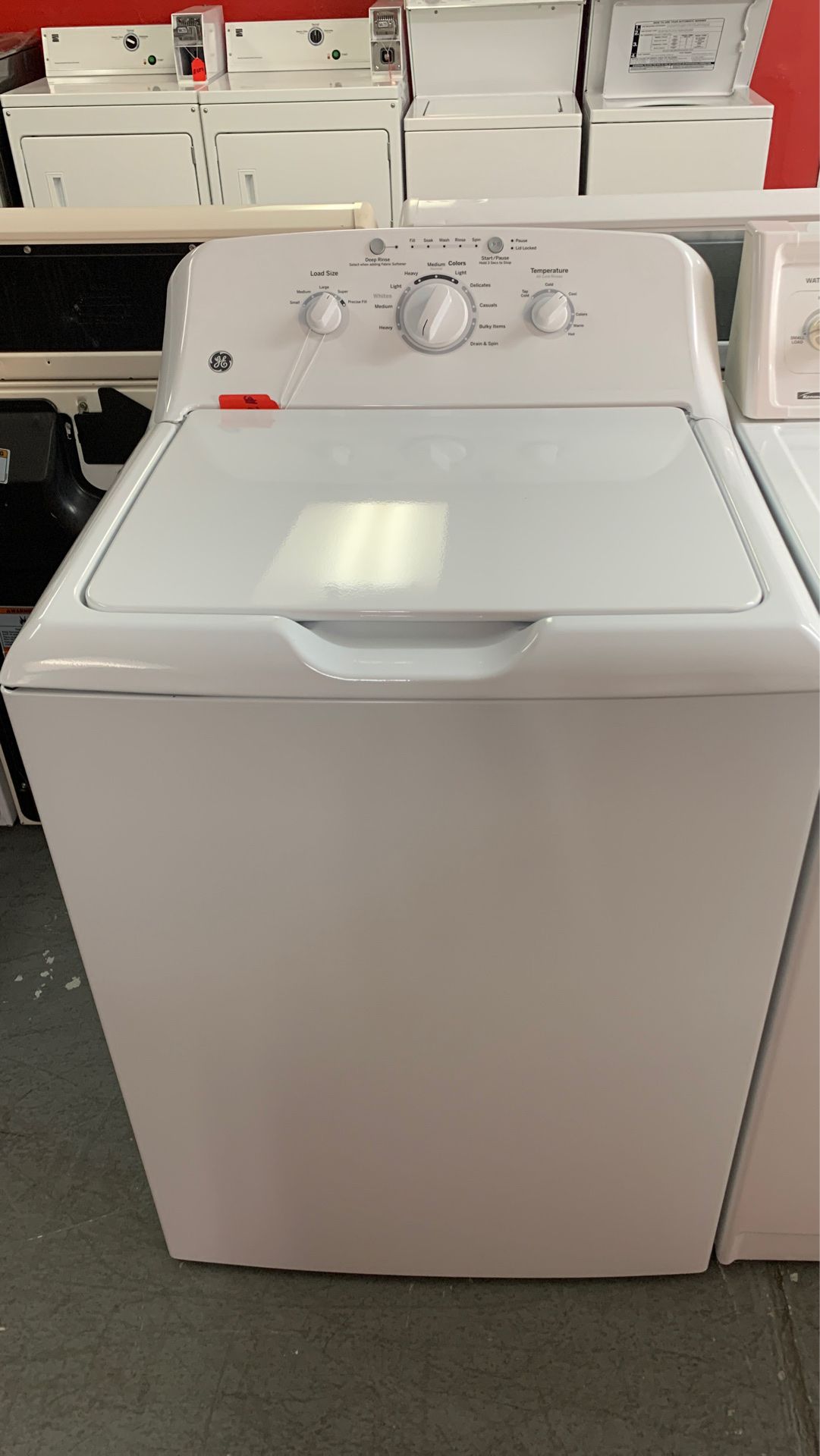 Scratch and dent GE super capacity plus washer one year warranty