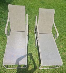Two aluminum commercial grade lounge chairs