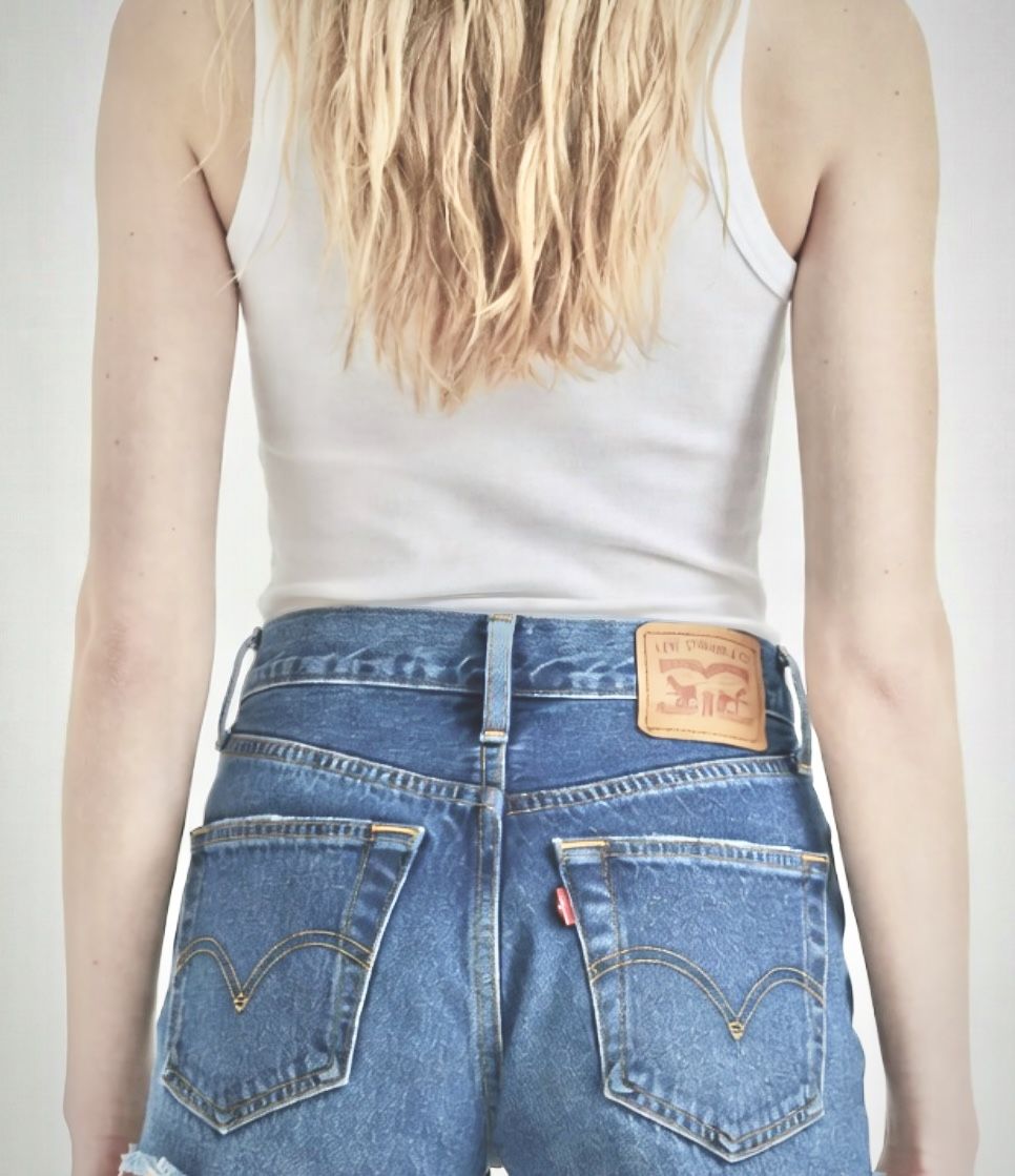 Classic high-rise Levi’s 501 women's denim/jeans shorts in medium blue denim