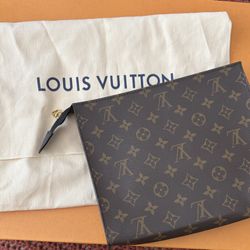 Authentic Louis Vuitton Poche Toilette with dust bag.
