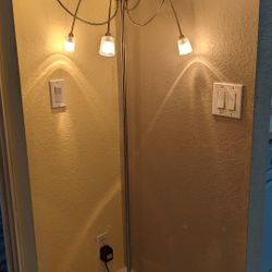 IKEA Kryssbo floor lamp in a nickel-plated finish