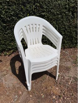 Plastic Resin Chairs. 4 Total