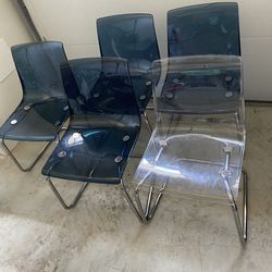 Ikea Tobias 4 blue and 1 clear chairs 