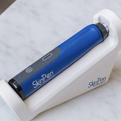 Barely used excellent condition Skinpen, and charging cradle microneedling