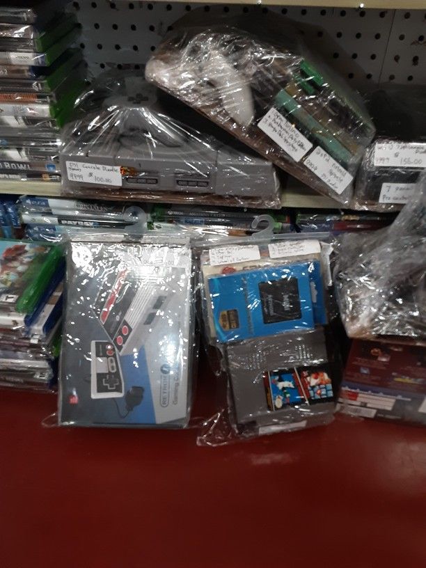 New Video Game Console Bundles At Crescent Moon Music and Collectibles ps4 ps1 wii U NES