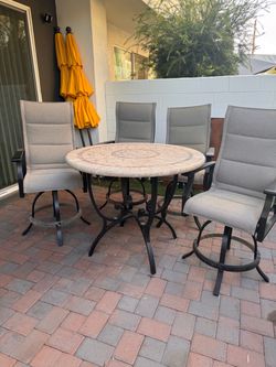 Patio Table and 4 Swivel Chairs