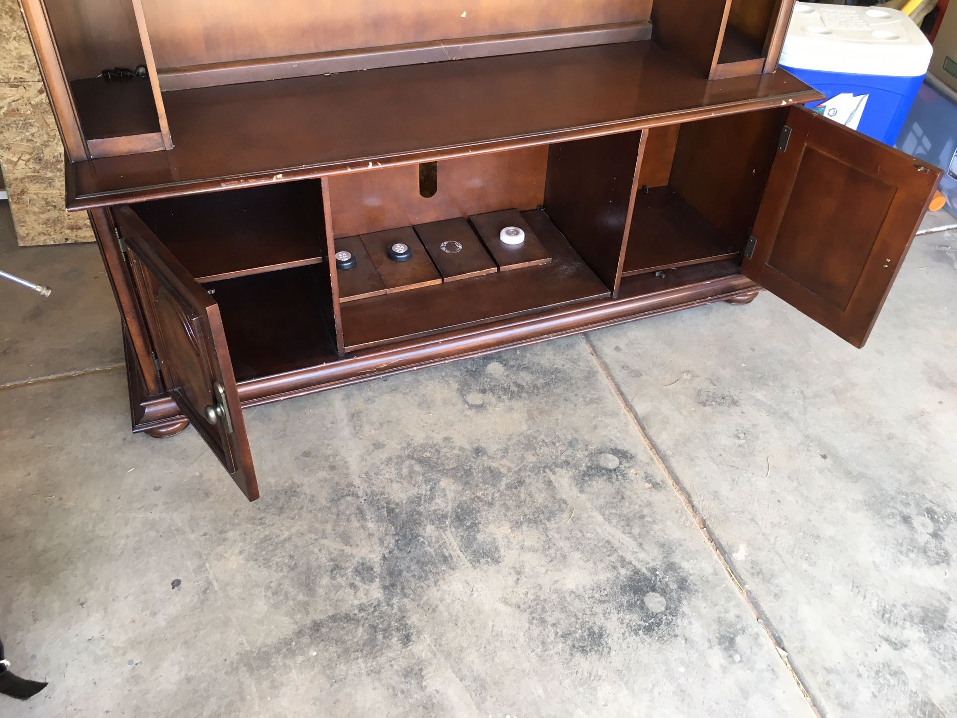 Television stand with cabinets and shelves