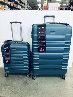 2 pice luggage set includes large size 30"x20"x12 and TSA accepted Carry-on size 20"x14"10. Has 8 spinner wheels and features a built-in lock