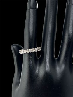 Oval diamond eternity band in 14k yellow gold